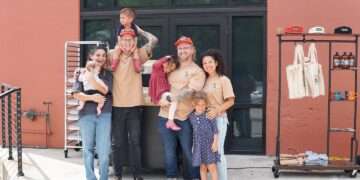 Caleben MacPherson and Hunter Keslar and their familes at Take Two Coffee