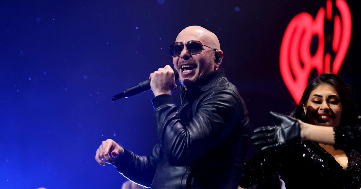 ST PAUL, MINNESOTA - DECEMBER 06: Pitbull performs onstage during iHeartRadio 101.3 KDWB's Jingle Ball 2021 Presented by Capital One at Xcel Energy Center on December 6, 2021 in St. Paul/Minneapolis, Minn. (Photo by Adam Bettcher/Getty Images for iHeartRadio)