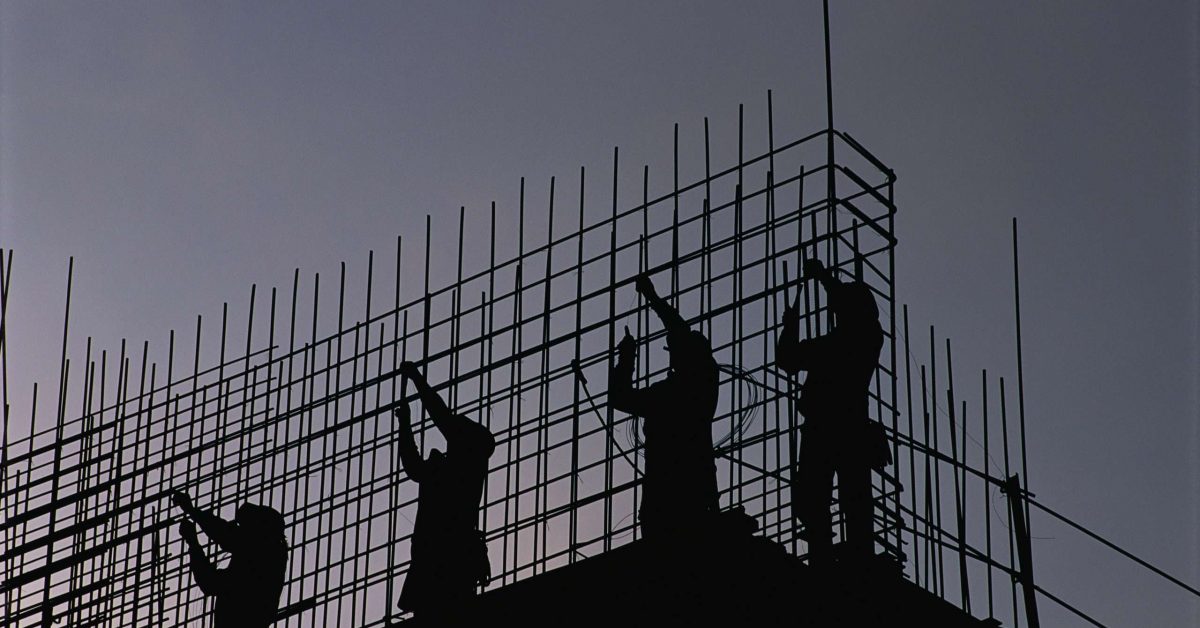 Construction Workers Installing Reinforcing Bars