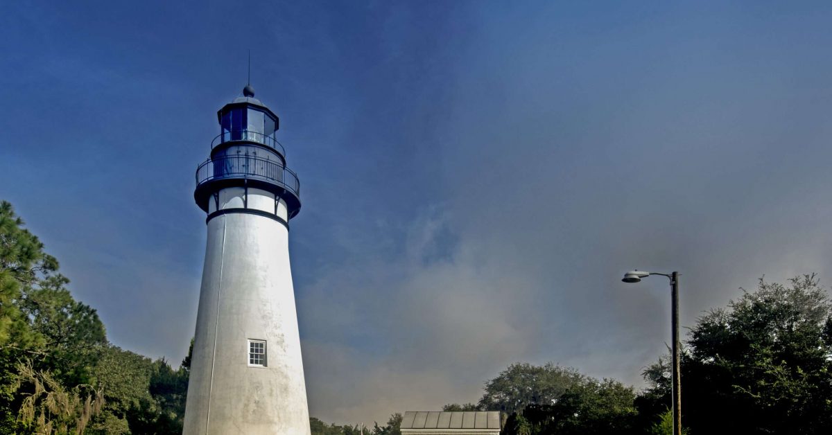 The Amelia Island Light is a lighthouse located on the north end of Amelia Island at the mouth of the St. Mary's River. It was built in 1838 using materials taken from the former Cumberland Island lighthouse in Georgia. The Cumberland Island lighthouse had been built in 1820. The lighthouse marks the entrance to Nassau Sound and the harbor for Fernandina Beach, Florida