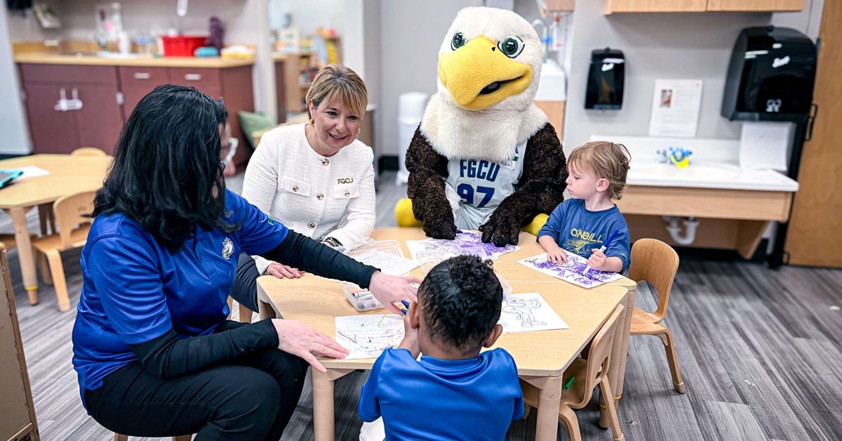 FGCU president Aysegul Timur and Azul work with children at the new Early Learning Childhood Development Center, a child care center in East Naples.